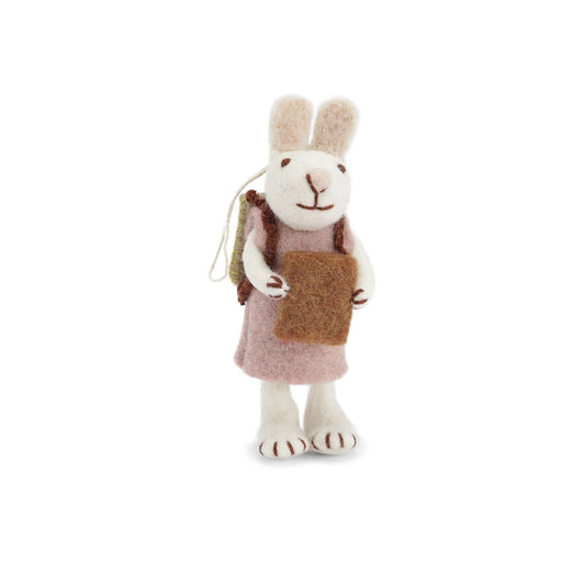 Weißer Hase mit Lavendelkleid und Buch